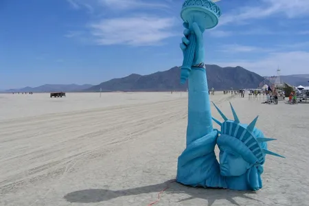 A Burning Man tribute to the last remnants of humanity, a buried Statue of Liberty, depicted in the 1967 science fiction film, Planet of the Apes. 
