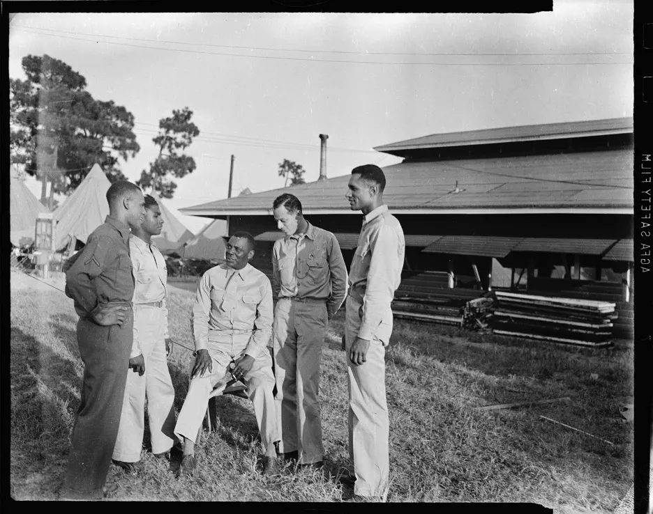 Five soldiers at training camp or base