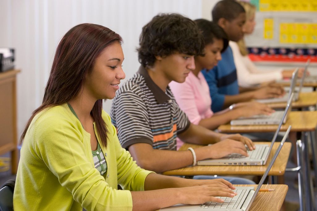 students on laptops