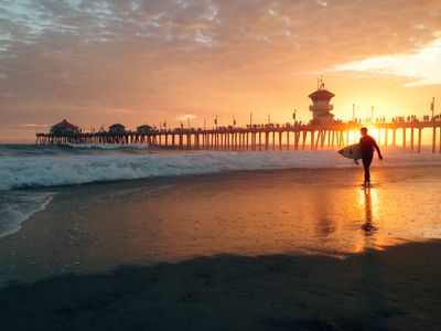 A surfer at Huntington Beach in Southern California