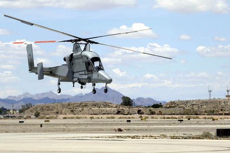 Following successful trials resupplying troops in Afghanistan, the U.S. Marine Corps brought the uncrewed K-MAX to Yuma, Arizona, to experiment with better integrating drones into the force.