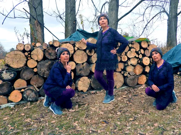 Kneeling and Standing by our woodpile thumbnail