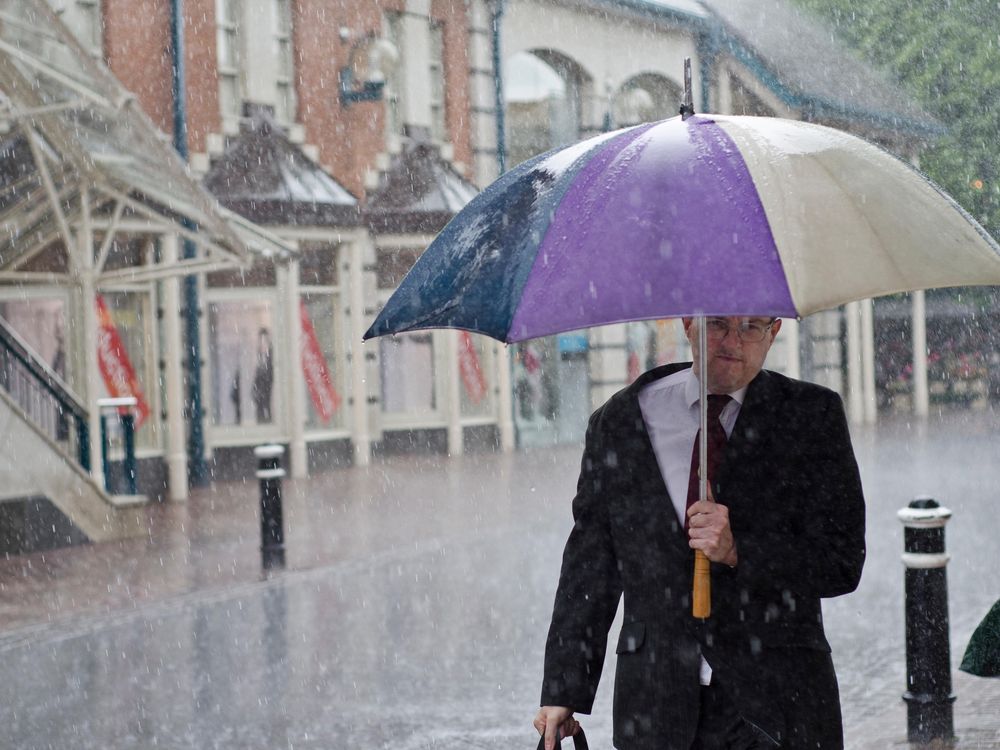 Man with umbrella