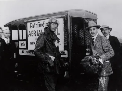 Pilot Max Miller and Air Mail Service superintendent Benjamin Lipsner (right) before Miller's pathfinding flight between New York and Chicago in 1918.