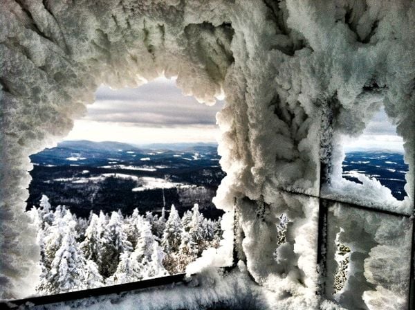 Looking out through the ice at the top of the Okemo Mountain Fire Tower thumbnail