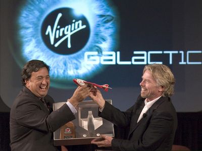 Back in 2005 Virgin Galactic and New Mexico worked out a deal for the state to build a multimillion dollar spaceport. Here's Richard Branson (right) giving Governor Bill Richardson a model airplane to commemorate the occasion. 