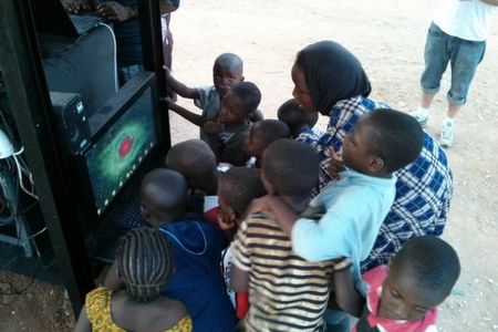 Kids in a small Nigerian village line up to learn at the Hello Hub.