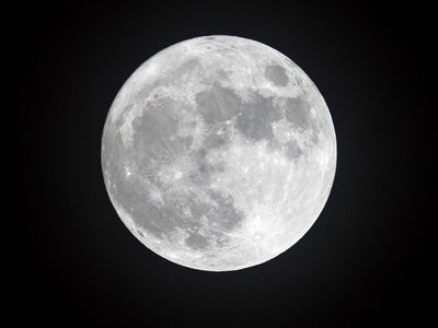 Scientists theorize that hydrogen from solar wind combines with oxygen in tiny glass beads to form water on the moon&#39;s surface.