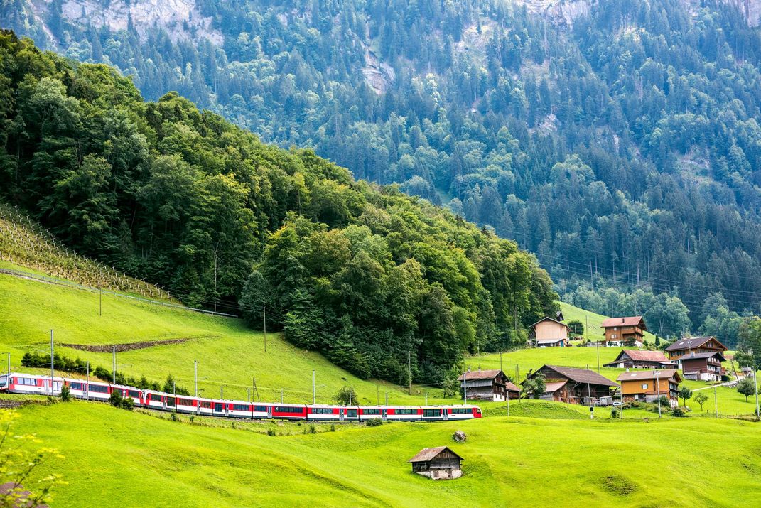 Traveling through the Alpine countryside by train