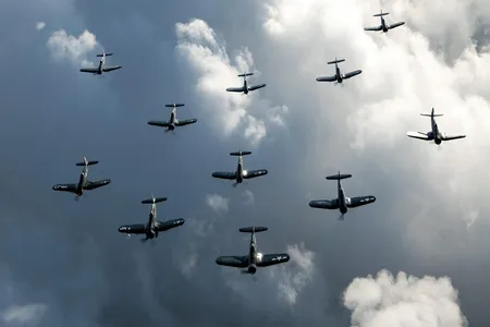 As many as 35 Corsairs still fly today, and 11 of them made it to the 2019 Thunder Over Michigan warbird show. Getting them all in one shot took the considerable talents of photographer Scott Slocum and photo ship pilot Bernie Vasquez. The Corsair legend is that it was too mean for the Navy so they gave it to the Marines. Here's the real story.