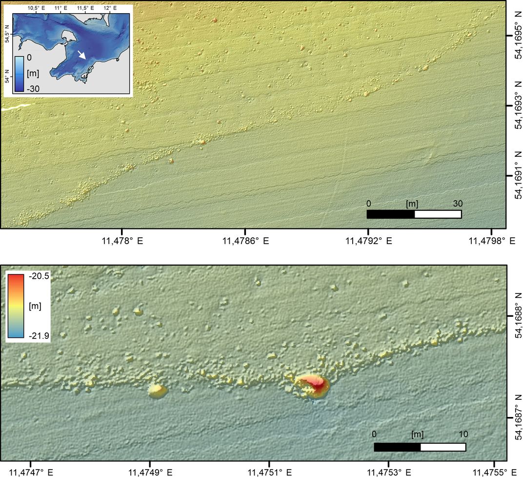 yellow-colored maps showing the wall of stones on the seafloor in a flattened s-shape