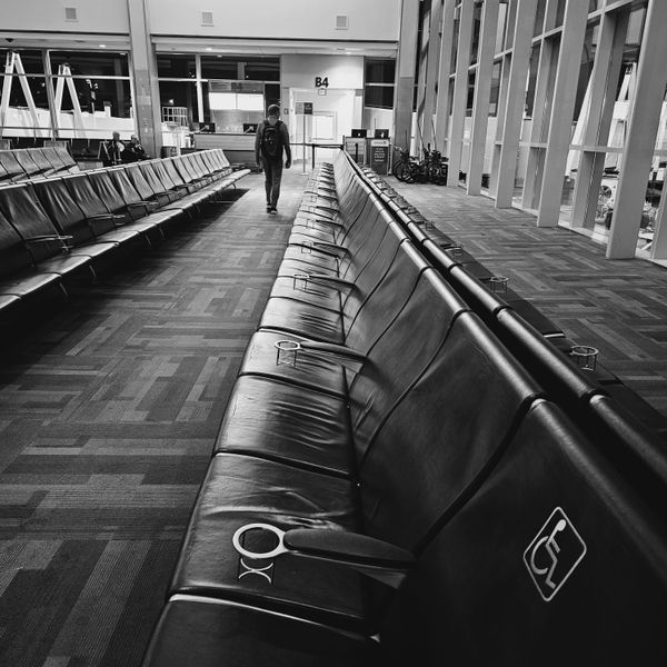 lonely airport passenger. Samsung s 23 ultra thumbnail