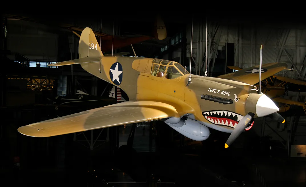 a Curtiss P-40E wears a shark face but was not a Flying Tiger