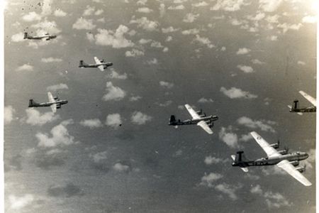 View, from slightly above, of several Boeing B-29 Superfortresses flying in formation, 1945.