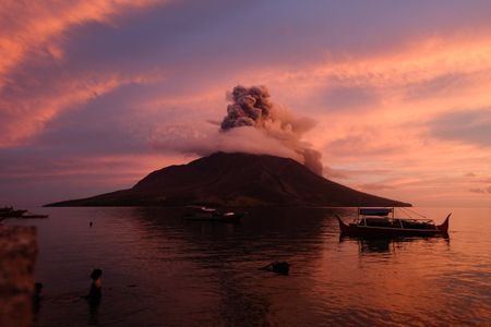 Mount Ruang in North Sulawesi, Indonesia, spews ash on April 19, 2024, after a series of eruptions earlier this week launched molten rocks into the sky.