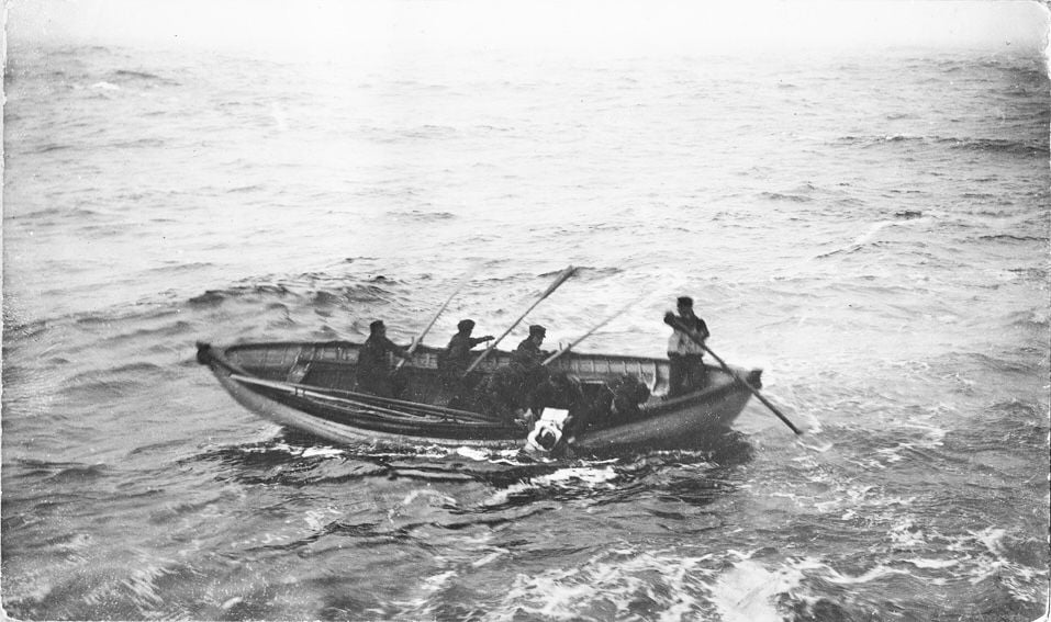 The crew of the Minia recovers the body of a victim of the Titanic disaster.