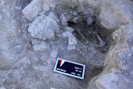 Researchers found the skeleton of a human (pictured) and dog left behind by a tsunami that destroyed coastal communities along the Mediterranean Sea some 3,600 years ago.