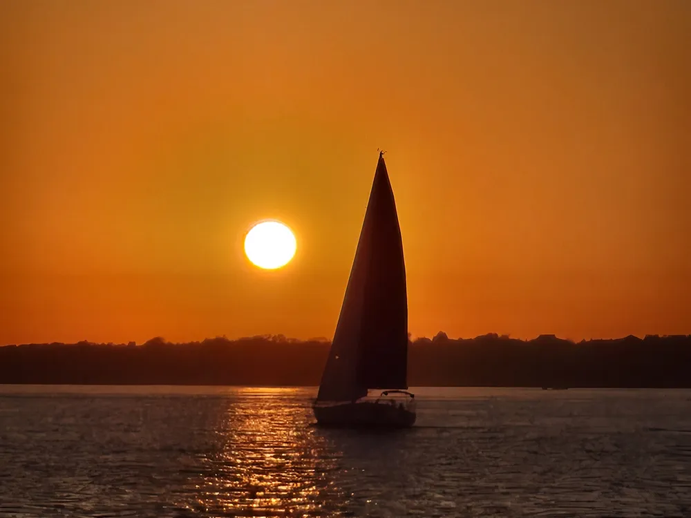 Sunset while sailing from Newport, Rhode Island | Smithsonian Photo ...