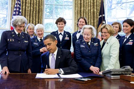 President Barack Obama signs legislation in 2009 awarding a Congressional Gold Medal to Women Airforce Service Pilots.