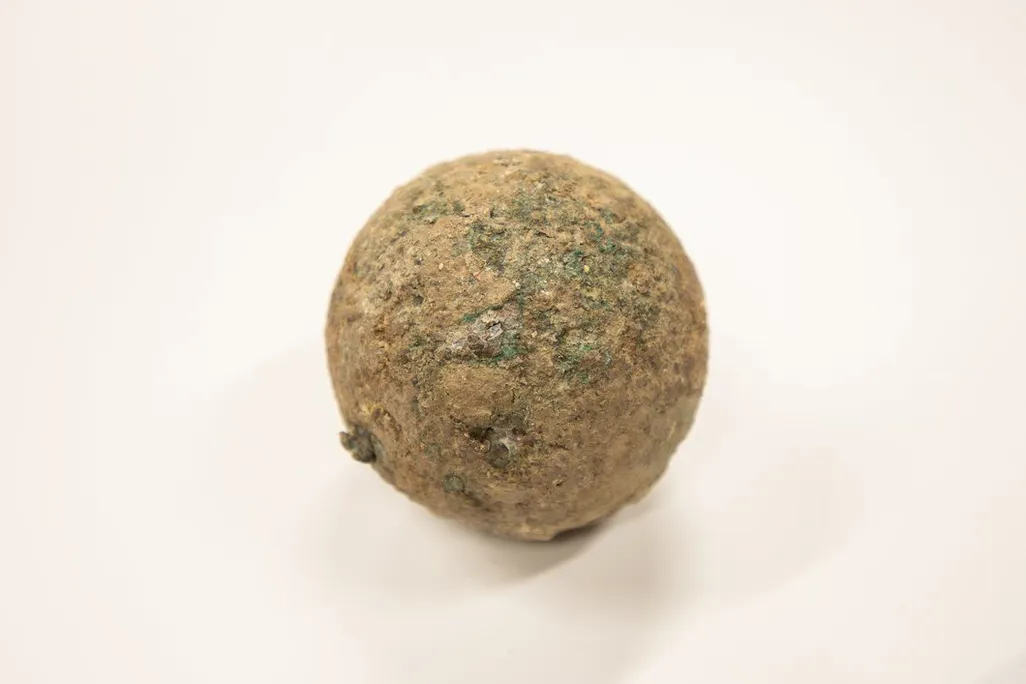 A cannonball against a white backdrop