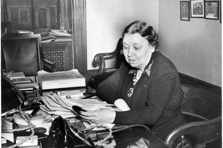 Hattie Caraway succeeded her husband as an Arkansas senator and then won re-election with more votes than her six male opponents combined. She's pictured at her desk in 1943.