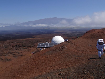 An "astronaut" walks outside of the HI-SEAS dome on Mauna Loa. 