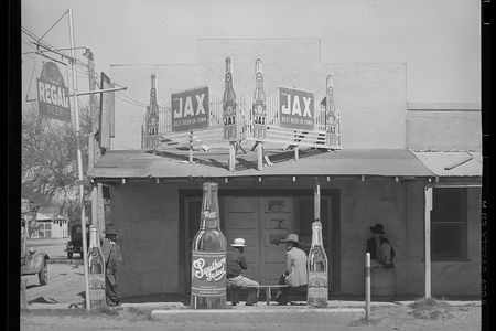 Black and white photograph of a the façade of a Mexican beer hall in Texas.