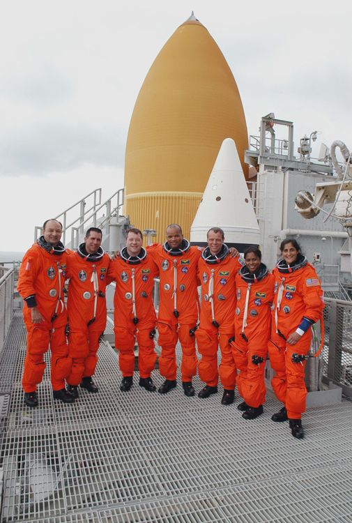 The crew of STS-116 prepares for their December 7 space shuttle launch.
