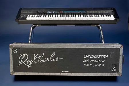 While on tour in the 1980s and 1990s, Ray Charles played this Yamaha KX88 electronic keyboard MIDI controller, customized with Braille.