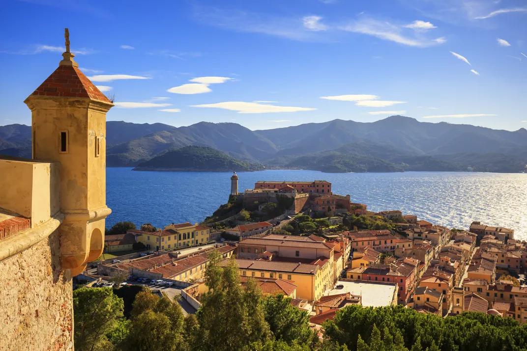 Looking out from Elba's Portoferraio to the hills of Tuscany