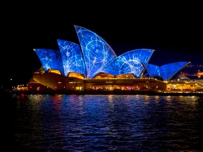 Lighting the sails at the Sydney Opera House.