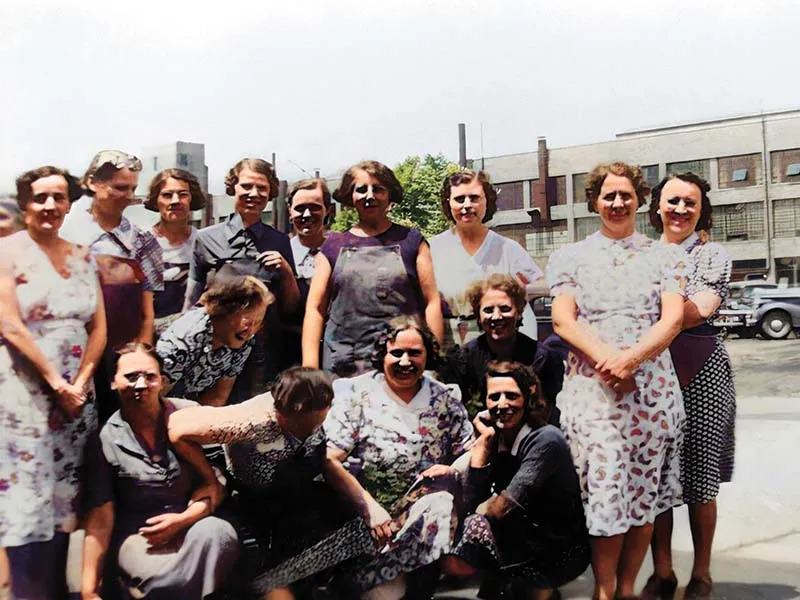 A group of women pose for a group portrait