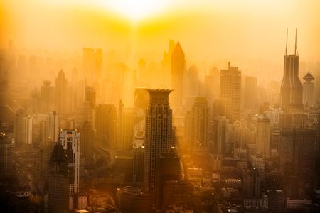 Smog glows in the sunset in Shanghai, China.