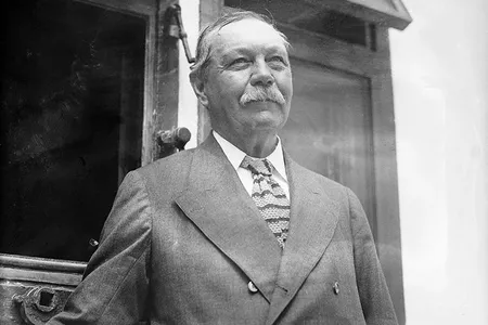 Sir Arthur Conan Doyle, pictured here in 1923, enjoyed using the methods of Sherlock Holmes on real cases. 