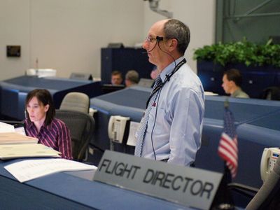 Flight Director Paul Dye presides in Mission Control during the STS-115 shuttle mission in 2006.