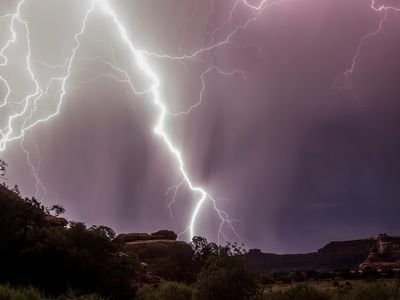 Lightning crackles across the sky over Canyonlands National Park in Utah.