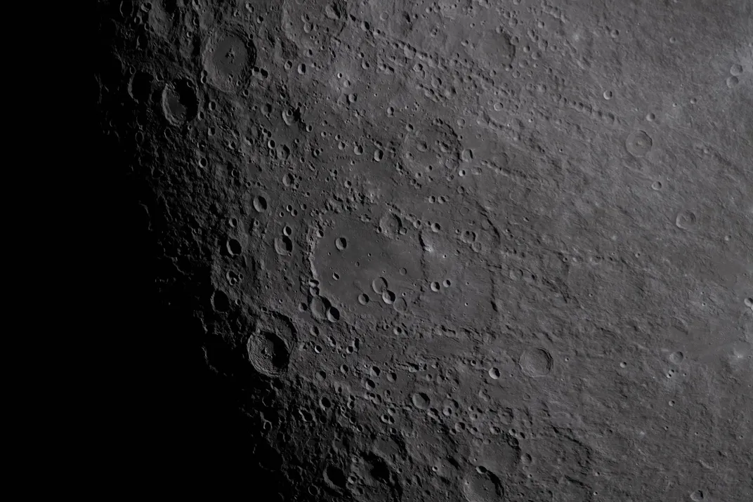 a close-up of craters on the lunar surface