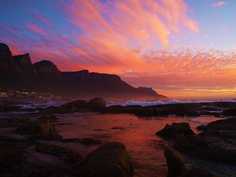 Enjoying Dinner on Camps Bay, South Africa at sunset. Smithsonian