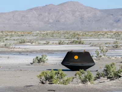The capsule holding the asteroid sample shortly after touching down in the desert on September 24 at the Department of Defense&#39;s Utah Test and Training Range.