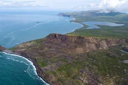 An aerial view of the northwestern corner of St. Matthew Island. The small grouping of uninhabited islands is over 300 kilometers across the Bering Sea from the mainland, making it the most remote location in Alaska.