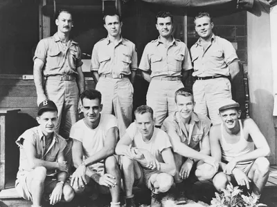 The Enola Gay crew (Van Kirk is standing, second from left).