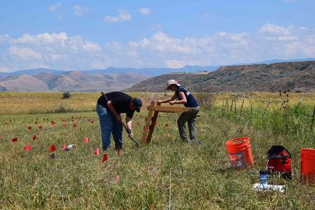 Archaeologists look for pieces of metal in their search for the remains of a massacre of Native Americans in 1863 in Idaho.