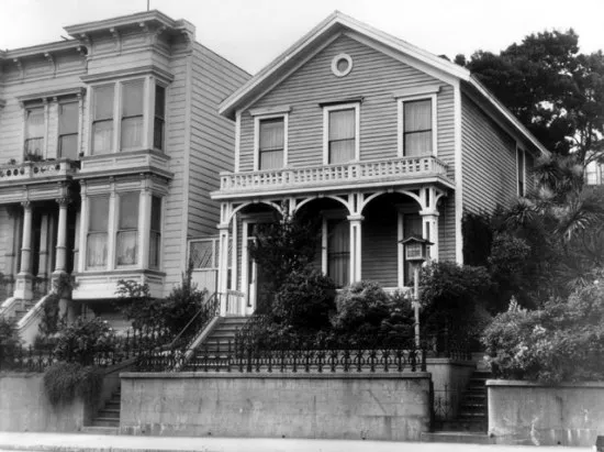 Black and white photo of Victorian home exterior