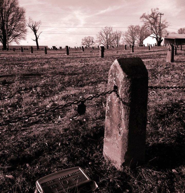 Old Graveyard behind Mental Institution. The headstones are connected