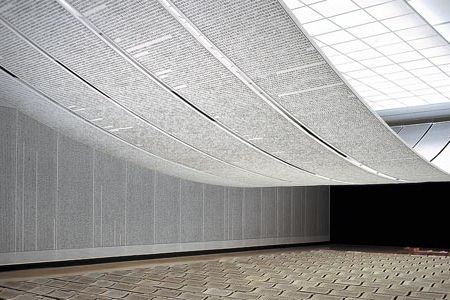Xu Bing's Book from the Sky(1987-1991), hand printed books, ceiling and wall scrolls printed from wood letterpress type using false Chinese characters, dimensions variable, installation view at "Crossings," National Gallery of Canada, Ottawa (1998).