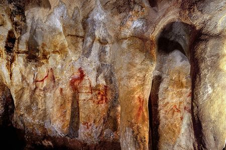 At La Pasiega in Spain, the scalariform, or ladder shape, composed of red horizontal and vertical lines (center left) dates to older than 64,000 years.