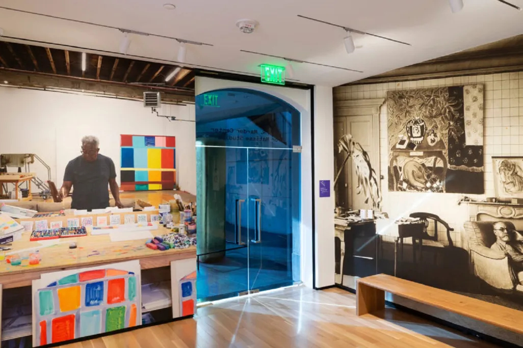 room with various colorful Matisse paintings hanging on walls