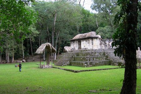 Smithsonian Tropical Research Institute archaeologist Ashley Sharpe contemplates the Ceibal site in Guatemala—one of the oldest Maya sites known.