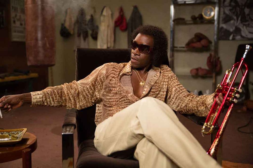 Don Cheadle as Miles Davis