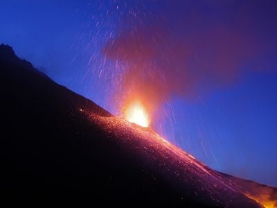 Mount Etna, Italy, erupts at night. 